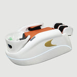 Load image into Gallery viewer, White massage chair with orange cushion on a gray floor, Shunlong logo visible