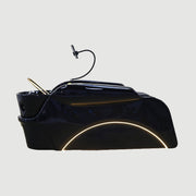 Black hair washing chair with illuminated interior in a salon setting, featuring Shunlong logo.