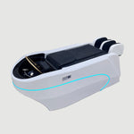 Load image into Gallery viewer, Modern massage bed with SHUNLONG branding in a room setting.
